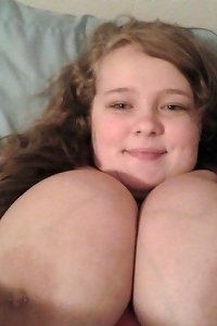 sensual chick seductively posing in undergarments